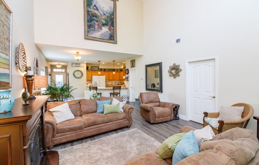 You must tour this beautiful end-unit townhome! Conveniently located and meticulously maintained. The spacious great room features soaring 18' vaulted ceilings, open kitchen with walk-in pantry, breakfast bar and main floor master suite w/private bath and walk-in closet. Also recently updated heat pump, new water heater, new dishwasher, all new faucets, all new light fixtures, new waterproof LVP flooring downstairs and new carpet throughout. Beautiful valley views and private back patio/yard area! Low maintenance. No cross traffic! HOA covers water, sewer, landscape improvements/maintenance, exterior painting, gutter cleaning, common areas, and exterior window washing.