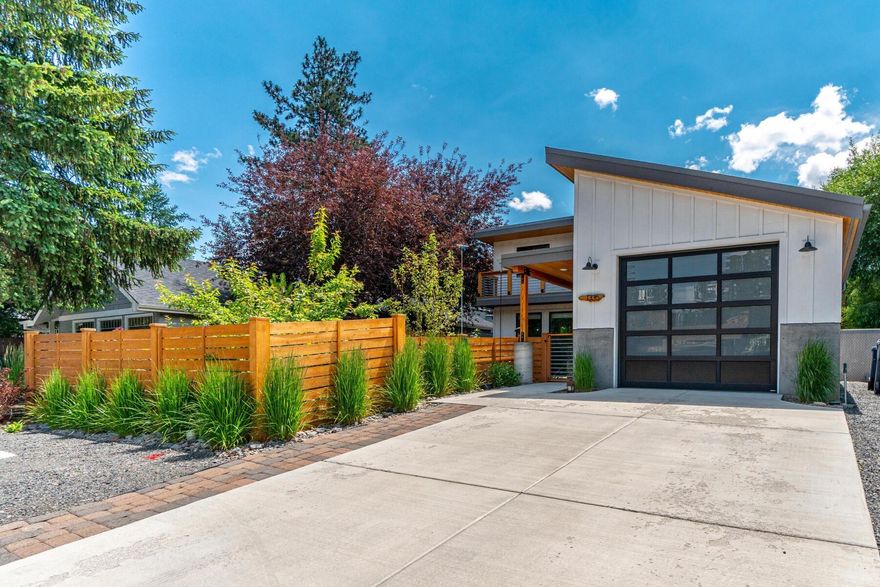 Live in your own private oasis on Bends west side just minutes from amenities, dining and entertainment!  After being lovingly remodeled in 2020 this residence now offers warm, inviting entertaining spaces, parking for 3 vehicles, a great garage to store your toys, RV parking with dump and hook-ups and an abundance of cool features everywhere you turn! The great room looks out over the private front courtyard designed for entertaining with a dining area, fire pit seating area and a tranquil rain garden that attracts wildlife. The main level features solid hickory hardwood flooring, tongue and groove ceilings in the main living area and a central kitchen that serves as the heart of the home. The upper level houses the primary suite, a full bath and 2 additional bedrooms. New owners will love the accessibility and convenience this property offers - to the Old Mill, concerts at the Amphitheater, the Galveston or Newport corridors, the river - they are all within easy reach!