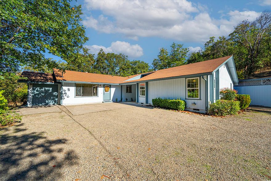 Better act fast! Great opportunity to own a spacious 2207 sf country home on 2.4 acres in great area on Old Stage Road! This single-level, comfortable home has wonderful space and loads of natural light. Privately situated surrounded by mature trees, the entry leads to a spacious living room with vaulted wood beam ceiling and woodstove. This room opens to a very large kitchen with big island with dining bar, tons of cabinets, storage and counter space. Very spacious open dining area with room for multiple tables or lounging chairs or couch and adjacent to 2 offices. Separate oversized family room is a huge bonus with room for gatherings, exercise or large projects. 3 bedrooms and total of 2 & ½ bathrooms. Workshop off the family room and separate outbuilding. Loads of off-street parking. Lots of potential to create beautiful gardens and outdoor living spaces and space for animals. We think this will go fast, don't delay!