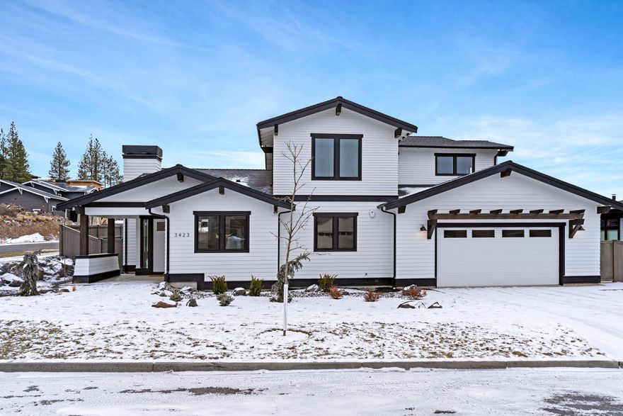 This newly constructed home by MCD Homes is located in the desirable Shevlin West neighborhood of Bend. The home offers 4 bedrooms and 2.5 bathrooms, with the primary bedroom on the main level. The primary bedroom's en suite bathroom features a walk-in shower, soaking tub, dual vanities, and a large walk-in closet. The main level offers an open concept living space, as well as a main level office and laundry room. The upstairs boasts three additional bedrooms, a full bath and bonus room. Perfect for entertaining, the home's large lot is an entertainer's dream, with a spacious covered patio off the living space and separate patio off the primary bedroom.