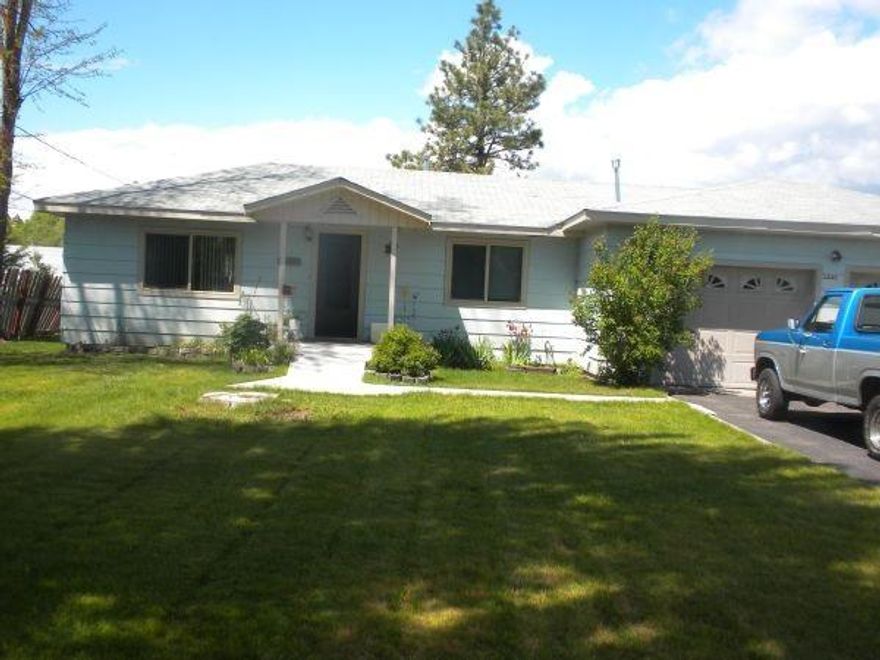 Looking For Acreage Here In Town-here It Is! 3 Bedroom With 1 1/2 Baths On 1.45 Acres. Great Pasture Fenced. Nice Big Mature Trees With Fruit Trees. Lots Of Room For A Garden Area. Raspberry Bushes And Flowers. Come Take A Look!