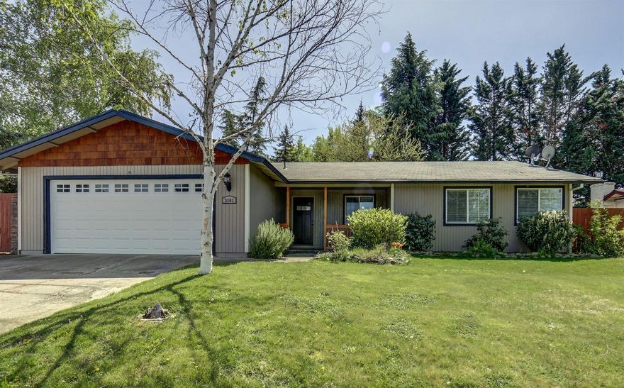 Don't miss this opportunity! This well kept, bright and beautiful home has hard wood floors, stainless steel appliances, and a large spacious kitchen. Located in a quiet neighborhood near Rogue Regional Medical Center. This home comes with a well shaded and large back yard with raised flower beds, brick patio with walkway to nice sitting area, as well as RV parking.