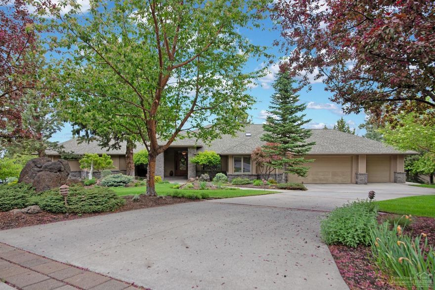 Beautiful single level home with a nice flat driveway that leads into a 3 car garage up on Awbrey Butte. The home boasts meticulous, lush landscaping as well as maple hardwood flooring, built in cherry cabinets and wool carpeting. There are 3 bedrooms with 3 full bathrooms plus an office and a large open great room. The home is in impeccable condition with nice views of the Cascades and Smith Rock from the home and property. Lots of storage!