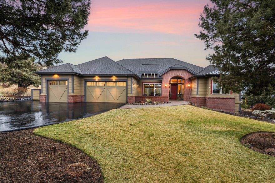 One of the best locations and views in Eagle Crest Resort, this private oasis is located on a flat lot offering stunning views of the majestic Cascade Mountains and backs to common space. Step inside and be greeted by lofty ceilings, walls of windows, custom lighting, solid hickory hardwood floors, and timeless finishes throughout.
Open kitchen, featuring custom copper details, slab countertops, an induction cooktop, stainless appliances, and a walk-in pantry with a custom copper barn door.
The formal dining room makes entertaining a delight with dual custom built-in buffets, a dry bar, a beverage refrigerator, and not one, but two wine refrigerators. The luxurious primary suite won't disappoint with a double-sided fireplace, a walk-in tile shower with dual shower heads, a jacuzzi tub, and a spacious walk-in closet with abundant built-ins.
Dedicated office, two additional guest rooms with an adjoining full bath, powder, utility room, & triple car garage. New roof 2/2025.