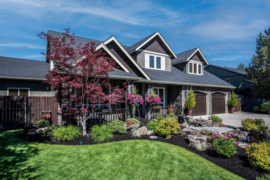 Stunning Eastside home on a large lot with front and back yards professionally landscaped with rock fountains, ponds and fire pit. The Home is very Open with Knotty pine vaulted ceilings and many 8-FT doors throughout, 4 beds and 3.5 baths with a Master suite on the main level. Also includes a huge bonus room and office that could be used as a 5th bedroom. New quartz countertops with backsplashes and stainless steel appliances. Hardwood floors. Fenced doggie turf rest area accessible from doggie door. Large lot that includes a newer covered 32x12 carport. Painted-floor in large 2-car garage with additional
tandem shop area. Home air-tested and sealed by Greensavers. Many updates and extras! Come see for yourself, you won't want to leave!