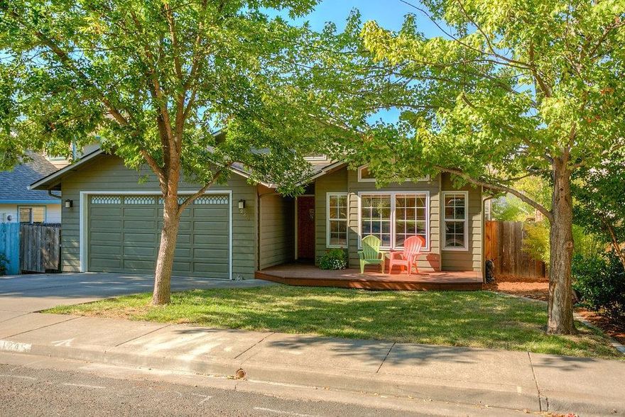 1993 built charmer in a great Ashland neighborhood close to town. This 2+ bedroom/ 2 bath, 1462 square foot home features vaulted ceilings, open floor plan, large windows and architectural detail throughout. Spacious 2015 remodeled kitchen with large center island, granite counters and refinished hardwood floors that open to the eating area and den. In addition the living room is roomy and light filled. Decks front and back add to the outdoor livability of this inviting home. Attached 2 car garage, raised bed gardens and close to city parks, restaurants, schools and downtown.