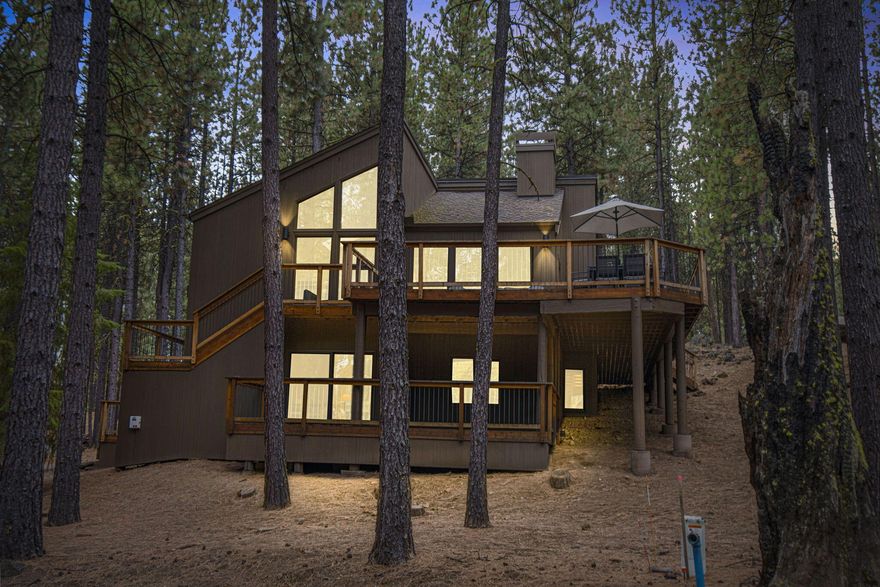 From GM249 there are conveniently easy paths to both Glaze Meadow Golf Shop and Glaze Meadow Rec Center.  The home features a floor plan designed for the active Black Butte Ranch lifestyle. Upper level offers an open concept main floor, with 2 primary bedroom suites. Remodeled kitchen that flows into the dining area, and the great room, with a wood stove, and birds-eye views of the natural, serene beauty. The views, including some of the GM 1st fairway and wildlife, continue from the wrap around deck, with choices for different sun exposures and star gazing, The lower level has access from the garage, a convenience for arriving guests. The  good sized bonus room, with a covered deck, is inviting to children for indoor and outdoor play areas.  Also, it is  a comfortable gathering area for adults who like to play, watch important sports events, or just relax. There are 2 additional bedrooms and a full bathroom. Enjoy 2 championship golf courses, tennis/pickleball courts, 6 pools