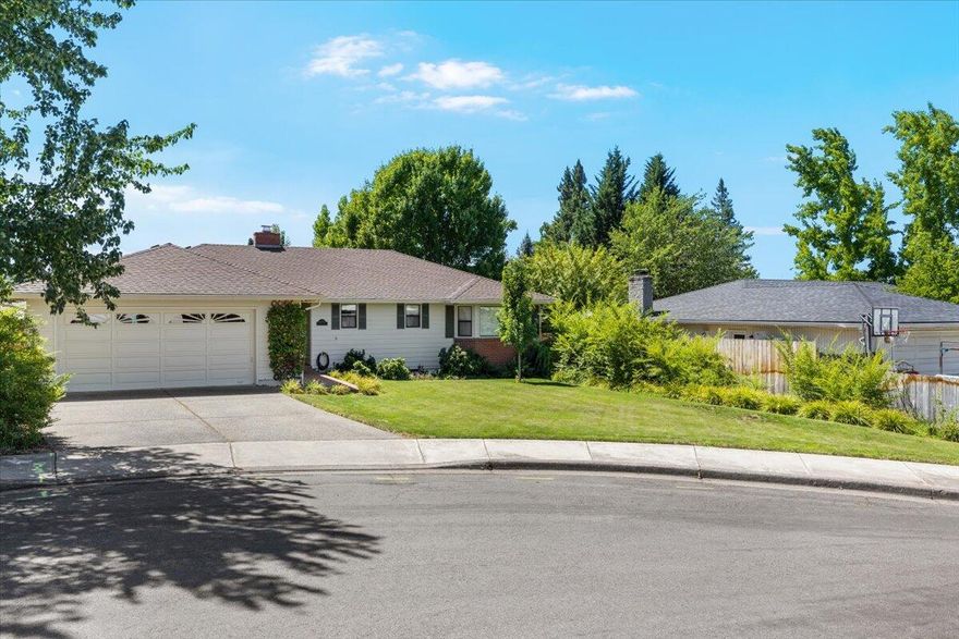 1 Owner house, first time for sale! This 3 bed 2 bath just under 1,700 SQFT house in a quiet E Medford cul-de-sac has great front and backyards. Inside you will find an inviting entry open to the living room and kitchen. The kitchen opens nicely into the dining room that connects to the living room complete with a wood-burning fireplace and sliding glass door to covered back patio and large, fenced backyard . Down the hall are the 3 bedrooms and hall bathroom. The master bedroom boasts a walk-in closet and ensuite bathroom. Recent updates include exterior paint and a new HVAC system both done in 2024. The garden is organic, no pesticides/chemical fertilizers used.