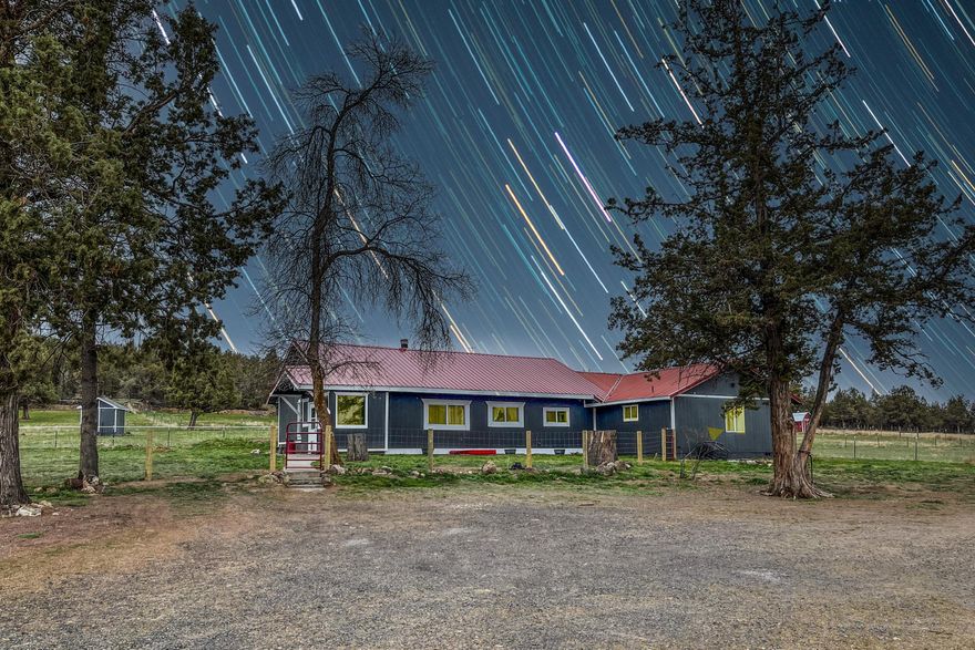 HUGE PRICE REDUCTION! BOM - BRING ALL OFFERS! New septic & leach line.  Well is tested & good! The original Davis Ranch house on 20 acres of fenced horse property. This ranch is oozing with history! The original house has been remodeled and updated. Built in 1952, effective year 1970, remodeled 2022. Windows and light thruout - 3 bedrooms, 2 baths, laundry room with W/D, antique claw tub (great for bathing your furry friends), huge main suite w/additional area for a sitting room or office and walk-in closet.  One of favored features for the ranch life is the large mudroom when you first enter into the home. The exterior has a large back deck, immediate fencing around the home for your pets and electric fencing installed for the several pastures (some with shelters) that surround property. Outdoor arena, round pen, tack shed, and the original barn building referred to as the ''Machine Shed'' built in 1930. Come take a look - it's Horse ready! Property can be sub-divided