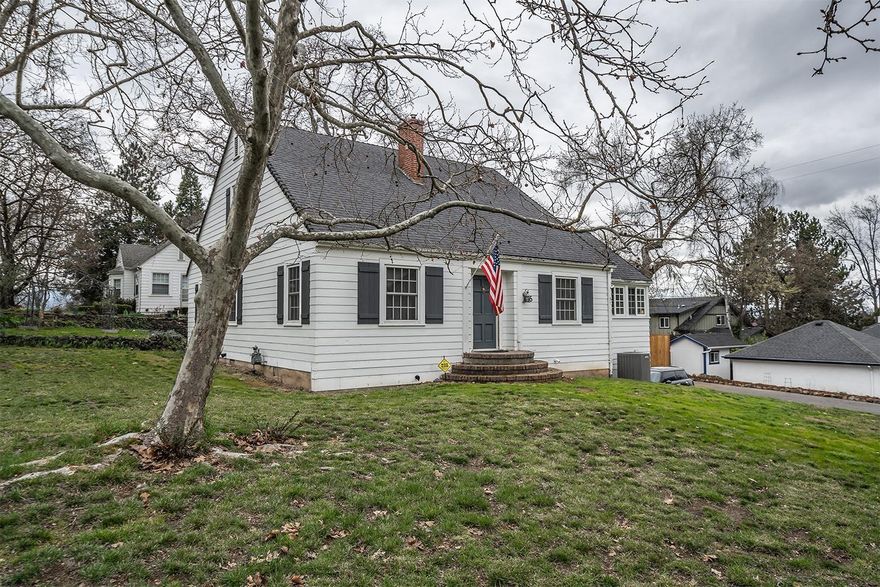 Classic Old East Medford'' location! Charming 1938 Cape Cod home offers 4 bedrooms, 2 baths, hardwood floors, vintage tile in baths, formal dining with built in china cabinet, cedar lined closets & lots of storage & built-ins. There is a cozy gas fireplace in the living room, & a charming sunroom off the kitchen w/ door to park-like backyard. Large daylight basement w/access to fenced side yard & garage. Situated on a large corner lot with mature landscaping. Newer HVAC system & updated windows. New sewer line to street. Great neighborhood!