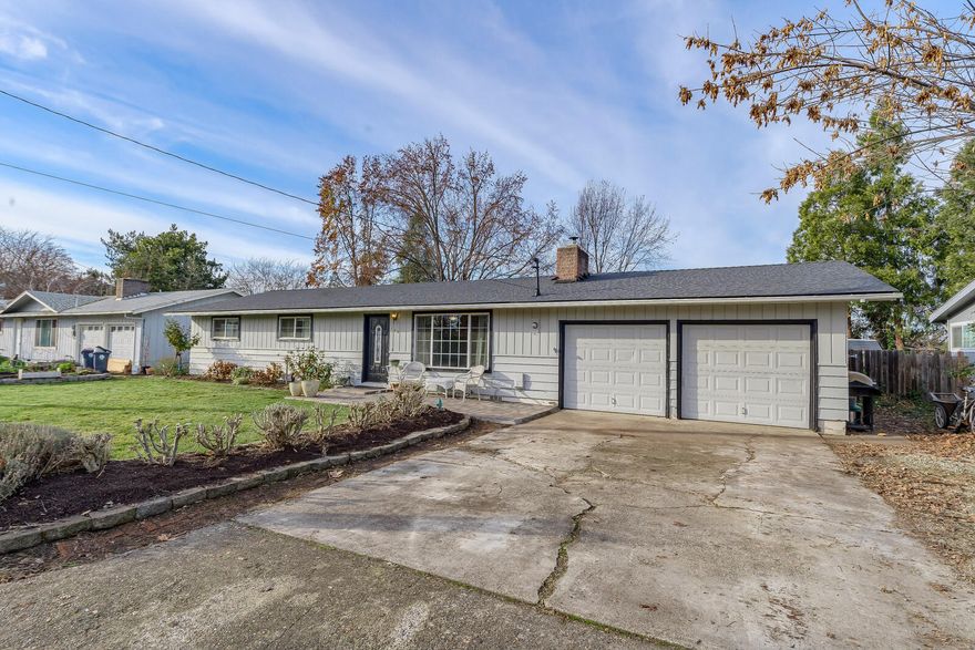 Great family home in established Central Point neighborhood! This 3 bed 1.5 bath home is centrally located close to schools, shopping and parks. Interior remodel done in 2018 which features original hardwood floors, Tile throughout the kitchen and bathrooms (including showers), Central Air, and wood burning fireplace insert, master bedroom with attached tile bathroom. A NEW roof was added in 2020 along with new laundry/mudroom! The oversized 2 car garage is perfect for the growing family. The large backyard is ideal for all the kids and a large paver patio for all your entertaining needs. This is a must see home in a must have location!