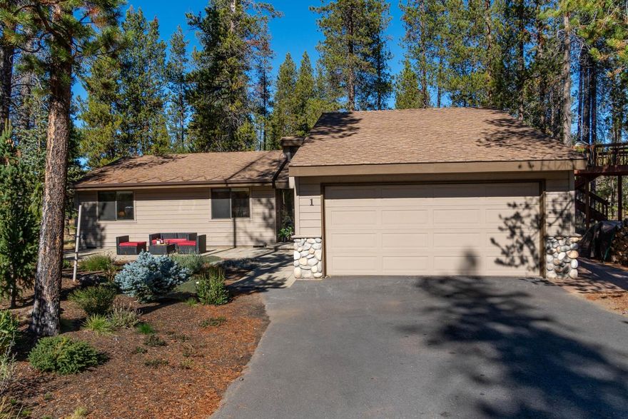 Welcome to 1 Witchhazel Lane, a single-level retreat located in Sunriver's quiet north end offering fantastic proximity to amenities. This sunshine streamed 1,196 sq. ft. home features 3-bedrooms and 2-baths with 2-car garage, and creates a warm welcome for family and friends. Abundant wood wrapped windows, vaulted cedar plank ceiling, woodburning stove with moss rock surround, and use of tile and stone throughout add mountain charm. The bright and spacious kitchen will delight the chef in you with plenty of storage cabinets, stainless steel appliances, granite tile countertops, and breakfast bar. Bask in over 300-days of Central Oregon sunshine on the expansive deck backing to forested common space. Enjoy the birds, deer and other wildlife that come to visit. Soak under the stars in the private hot tub. Whether you are looking for a full-time residence, an investment property, or vacation home, this is your basecamp for adventure! Sold turn-key and ready to start making memories.