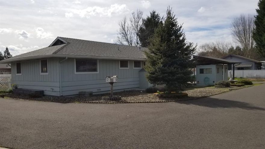 The biggest lot on Rhumba and a great location for storage and close to walking to the Rogue River and parks. Welcome to this updated home with New Roof, paint, fixtures, flooring and more. Brand new Air conditioner just installed. Great paved driveway that leads to an over-sized two car garage/Shop and a covered carport area for more parking. Nice one story floor-plan with lots of windows and a huge trex deck off your back porch with a mountain view Garden area, fenced and conveniently located, this home is perfect for someone that wants to live in a great subdivision but with a larger lot. Great cul-de-sac street with plenty of off street parking as well. Get this beauty on your list and visit anytime. One unique bonus is a small building by the carport that can be used for a home office! See 2114 Rhumba today in Grants Pass! All information deemed accurate but not guaranteed and subject to change at any time.