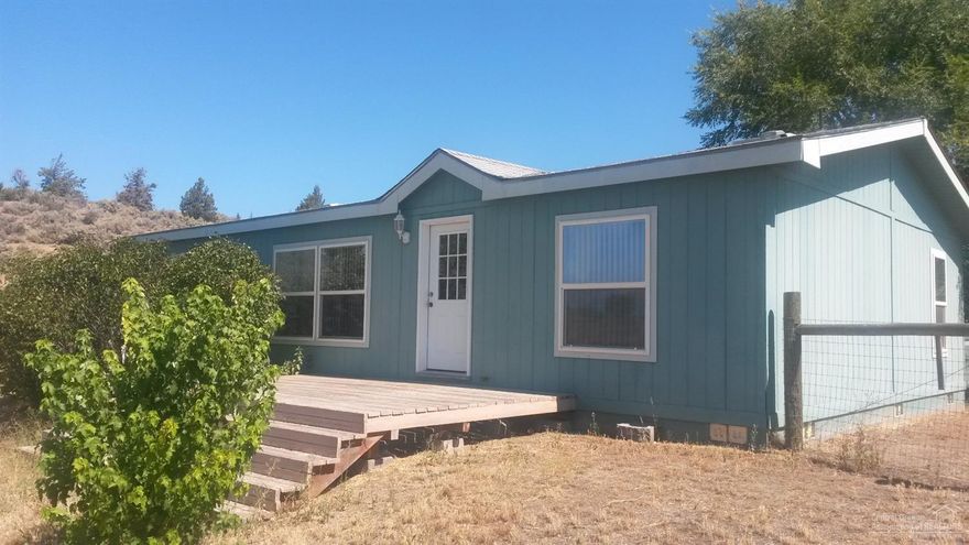 Cascade Mountain Views from this home on 1.21 acres. Fenced for animals. Small storage shed. Easy to see, come take a look!