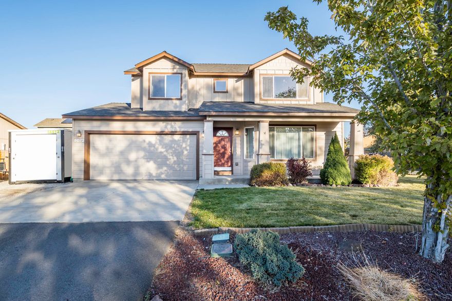 Nice home on large corner lot features 4 bedrooms and 2 1/2 bathrooms! Main level features Living Room, Kitchen, Dining Room, Bedroom, half bath, and laundry area. Second level features a large, vaulted master suite with double closets. Additional two bedrooms and full bath. Updates include new interior paint and carpet. Attached 2 Car Garage. Huge yard fenced and lots of RV parking!