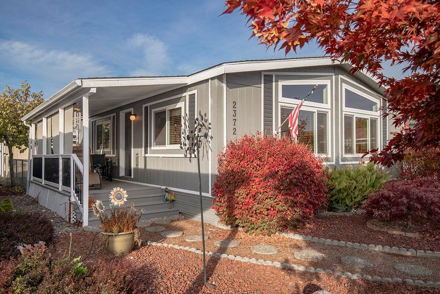 Wonderful Manufactured Home located in one of the Most Desirable Parks in Grants Pass! The Superbly-Kept Home offers a Light Open Floor Plan, Large Living Room, Attractive Useable Kitchen, & Nice Dining Area. The Master Suite offers an Attractive Bath & Walk-in Closet! You will be pleased by the many Fantastic Recent Upgrades & Updates here. Your concerns about Major Expenditures will be mitigated by the Newer Flooring, Paint, Front Covered Deck, Windows, Counter Tops & 'Roof-Max' Roof Coating completed in 2024! Outdoor Living can be readily enjoyed from the Large Covered Front Deck. The Paved Drive, Carport & Shed offer plenty of Parking & Storage. The Desirability of this Park is Magnified by the Amazing Community of People, &  Unexpectedly-Low Affordable Space Rents. This is Simple Easy Living just on the Edge of Town, but in a Fantastic Community, moments away from Parks & the Rogue River!