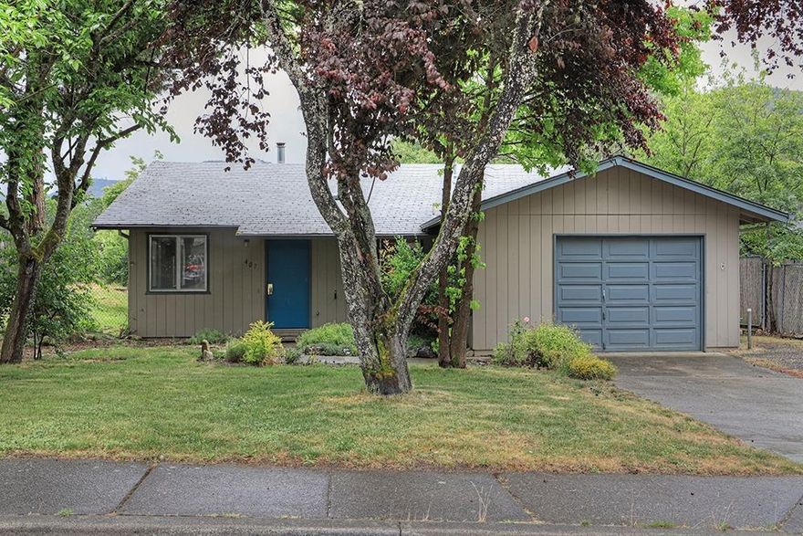 Check out this ready-to-move-into gem in a quiet Rogue River neighborhood. Tree-shaded front yard invites you to step inside the spacious living room and dining area. 1176 square foot home is three bedroom and two baths and neat and clean inside and features a nice, private backyard that opens up to a large, open space. Room to park your a boat or RV.