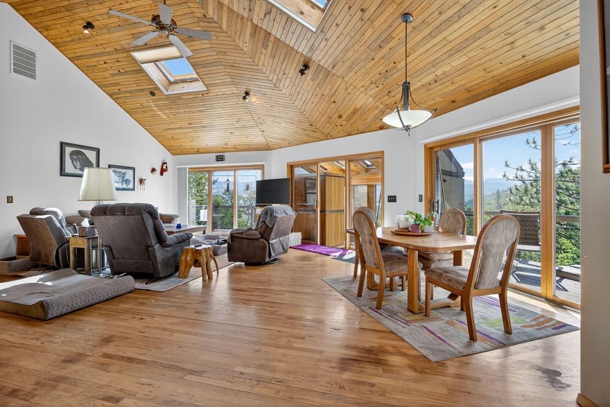 Serene retreat tucked into the trees, just minutes from downtown Ashland. This beautiful 5 bedroom, 3 bath home with separate living area downstairs, sits on over 5 acres with a Koi pond, fruit trees, and lake and mountain views, offering the
perfect blend of privacy and convenience. With vaulted ceilings, large view windows, an open-concept floor plan, the home is filled with natural light and peaceful forest views. Enjoy main floor primary, multiple view decks, office, sunroom with sauna, large kitchen pantry, separate living area downstairs with kitchenette, living area, 2 bedrooms, bathroom. Owner upgrades: generator, roof, 2 car garage with shop, Koi pond, covered patio with fire pit, new water heater, solar panels, mini-split, furnace, outdoor lighting. Whether you're entertaining or relaxing in nature, this home offers a rare lifestyle opportunity. Don't miss the oversized garage and bonus shop.