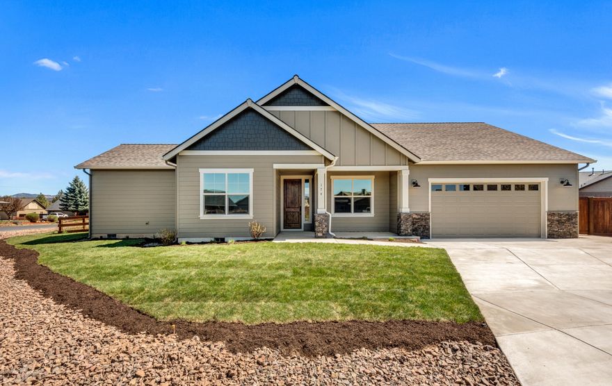 Welcome home to the coveted Saddle Ridge Ranch! New construction single level home from an award winning builder on a .21 acre lot with a premium finish package. Upon entering the 8' knotty alder wood door you will find European white oak flooring, hand textured walls, high vaulted ceilings, floor to ceiling windows and a modern fireplace. Spacious kitchen complete with quartz countertops, full tile backsplash, dovetailed soft close cabinet drawers and doors with under cabinet lighting and KitchenAid stainless appliances. Luxurious primary suite includes dual vanities, tile shower and a large walk-in closet. Wonderful outdoor living areas with covered patios that overlook a fully fenced and professionally landscaped yard with complete irrigation system. This is an amazing home in a wonderful neighborhood, there are far too many unique features to list. Call anytime for an appointment or come and see us at our model home on Fridays and Saturdays from 11-2pm.