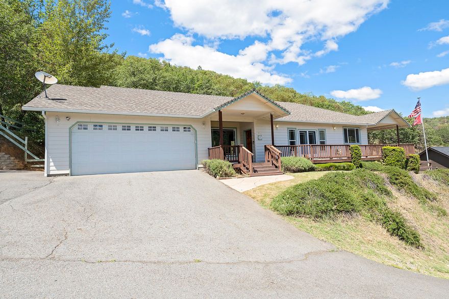 Situated in the Whitestone Estates, this 2 bedroom (plus office), 2 bath home was built in 2003 and has 1740 sq. feet.  Features include great room with coffered ceiling, with ceiling fan, free standing gas log stove with river rock surround, and french doors that lead to the great views from the front deck!  The kitchen has a five burner gas stove top w/downdraft, double wall ovens, newer refrigerator, cabinets with slide outs, vaulted dining area with fantastic mountain views and a wet bar. The master bedroom has a vaulted ceiling with ceiling fan, ensuite bath with tiled shower with 2 shower heads, linen cabinet, and walk-in closet.  Both bedrooms and office have access to the front deck. The attached two car garage is extra deep and has lots of cabinets for storage and a utility sink, plus there is RV parking available. The interior was repainted in June 2022 and the HVAC system was replaced in May 2022 and is all ready for someone to call it home!