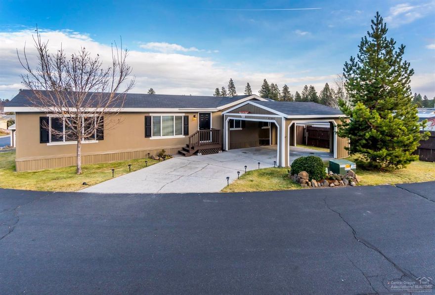 Spacious home w/great floor plan in Golfside Park! All new SS appliances made in America. Island kitchen w/eating bar, lrg laundry/mud room. New toilets, brushed chrome fixtures, faucets, white cabinets, custom countertops, lrg bedroom closets. Traffic Master Expresso laminate, new stain master carpet & pad. New paint w/modern colors indoor & out. New entry deck, large back deck, fenced yard, nice shed & carport. Enjoy the security of leased land, capped increases, playground, clubhouse. $411 Land Lease.