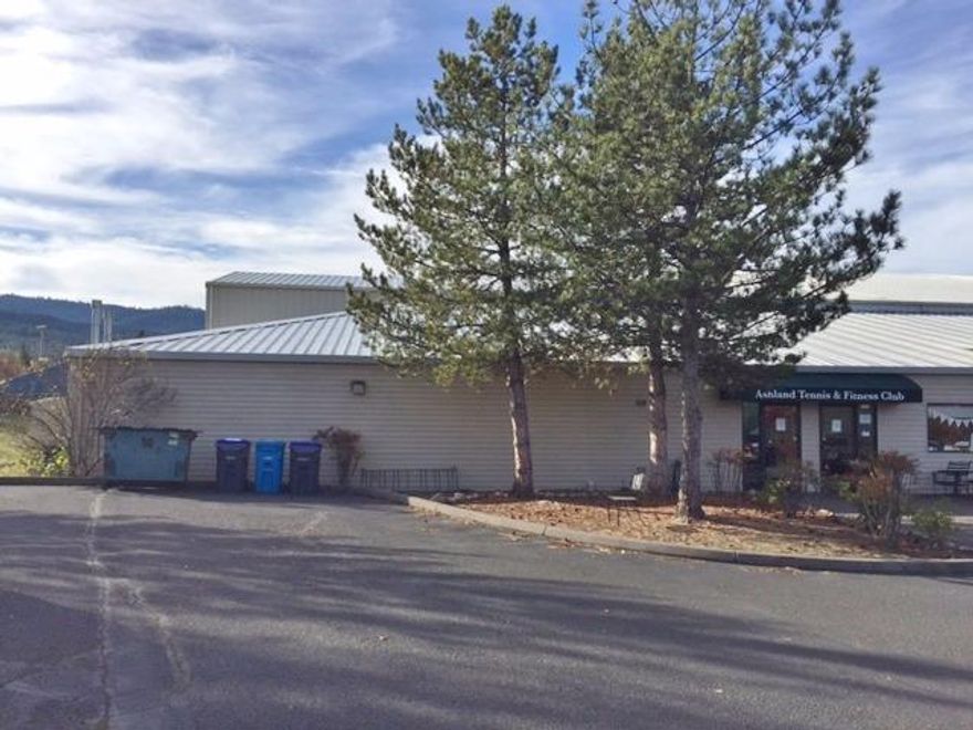 EXCLUSIONS to listing! Contact Listing Broker for information. Extremely nice approx. 37,000 square foot building in Ashland now available! Currently the Ashland Tennis & Fitness Club, this is a very utilitarian metal construction building that can accommodate many potential industrial, recreational retail, medical or other uses. High ceilings in the main warehouse building(approx. 26' at eaves and 37.5' maximum clear height), large restrooms & men's & women's locker rooms, large front lobby & showroom/retail/exercise area, heated 75' long lap pool in separate room, mezzanine area and more. The court area/main warehouse building is well insulated with 3 gas fired space heaters. Area also has a dock-high roll-up door and 4 grade level roll-up doors. Tennis & Fitness Club tenant will vacate upon closing if Buyer desire. Motivated Sellers!