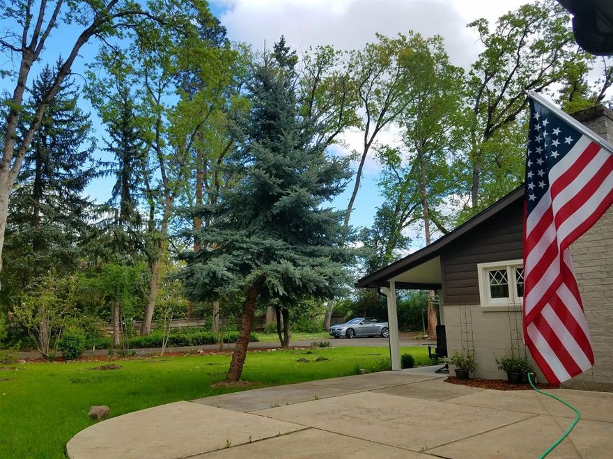OK, are you searching for a home on the A-M-A-Z-I-N-G Janney Lane on over .80 of an acre with 2 shops? The house is about 2000 sft and has been lovingly remodeled but has lots of charm from yesteryear! Home offers 3 bedrooms with an office (or 4th bedroom) Wonderful setting with lawns, large trees, flowering plants, patios and carport. In the shop there is a office, 1/2 bathroom, wine cellar and laundry hook ups. Also a well, city water and natural gas too! All this just 5 minutes from Jacksonville. I could go on and on!!! The best part is the price at just $475,000.
