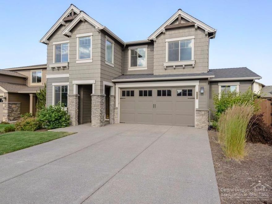 Popular neighborhood is resort like with beautiful landscaping, trails, water features, clubhouse w/basketball court, pool, park and more! Open great room concept w/4 generous bedrooms, Bonus Room and a den/office. Many upgrades include soft close drawers, AC, stacked stone fireplace w/blower, decking, landscaping and window blinds. Spacious master suite w/tile shower, dual sinks, soaking tub and walk-in closet. Extended garage allows for a shop/storage area, plenty of room in addition to parking 2 cars.