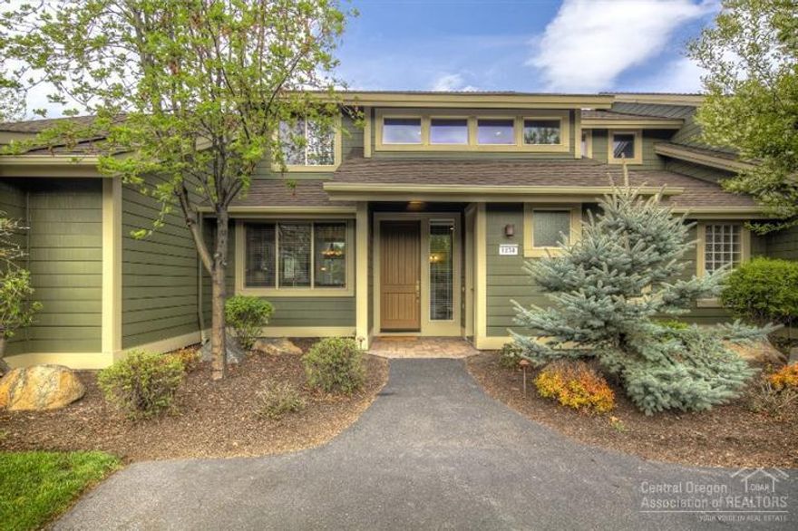 One owner home meticulously maintained as a 2nd home, this 3 bedroom, 2.5 bath Creekside townhome is ready to go. This sought after setting overlooks the babbling creek w/gate to access the grass area. Luxury upgrade package w/cherry cabinetry, granite tile kitchen counters, black appliances and slate flooring. Main level master bedroom, sliding doors from great room & master out to paver patio deck. Additional 2 bedrooms, full bath & loft area upstairs. Great Location to Pool & Sports Center!