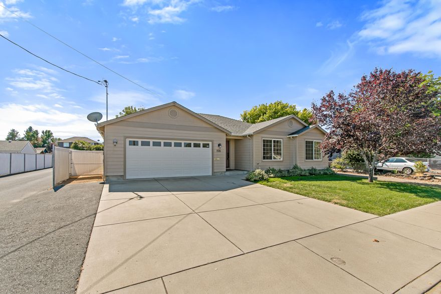 Central Point gem built in 2007 and lightly lived in by one owner. Used part time and now offered before winter. Impeccably maintained with great curb appeal, lush lawn, and mature landscaping. Tile entry opens to a spacious living room with big windows and a slider to the fully fenced yard. Open kitchen with granite, custom cabinets, pantry, and all appliances included refrigerator, oven, microwave, dishwasher, washer, and dryer. Brand new carpet and fresh interior paint. Smart plan with a large primary suite at the back with walk in closet, walk in shower, and slider to the yard. Two additional bedrooms are comfortable with updated lighting. Finished two car garage, vinyl fencing in the rear, shade tree, and landscaped yards with sprinklers complete the package. Vacant, easy to show, and move in ready.