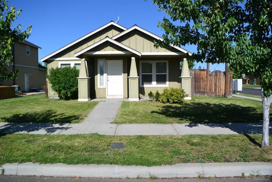 This single-level home in Hayden Ranch Estates is close to schools, shopping & downtown Redmond. Features include tile entry, dining area, kitchen with breakfast bar, lots of cabinet space & pantry. 3 bedrooms, 2 full baths, 1030 sq ft on a nice sized corner lot. Stay cozy & warm with the natural gas forced air furnace. Fenced & landscaped yard with sprinkler system, covered porch & attached 2 car garage with alley access. RV and boat parking!