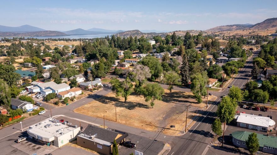 The sky is the limit on this fully developable block of commercial property in the City. Very unique opportunity on .95 acres, located just one block up from one of the busiest intersections in Klamath County (Oregon Ave and Biehn St) and minutes from OIT, Sky Lakes Medical Center, many medical practices and downtown.  This Neighborhood Commercially (NC) zoned land has endless possibilities for pretty much any kind of use from residences to commercial and is surrounded on all 4 sides with streets for an abundance access points. Biehn St, Prescott St, Modoc St and Lytton St all form this square block that could be split for a multi-use situation or kept together for a larger project. City utilities are located at the property. Virtually anything can be built and developed here, creating a PERFECT opportunity to get in on development at a reasonable price!