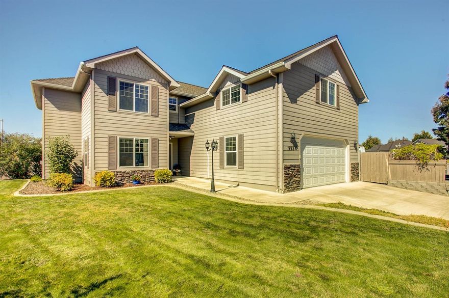 Corner lot in the coveted Central Point East subdivision, this two story home has much to offer. Outside there is over 100' of RV parking with 110,220 and water hookups. The large backyard comes complete with a lawn, flag stone paver area and covered porch for year round enjoyment. The interior boasts tall ceilings, large living room connected to the kitchen and dining room. The Master suite is on the first floor complete with a large vanity, jetted tub and tile shower with separate toilet area. Upstairs are two large bedrooms and a huge bonus area perfect for entertaining!