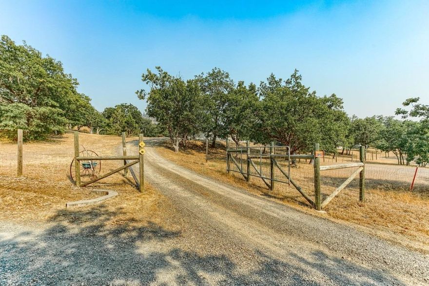 This is a very nicely updated home on just over 10 acres, located 15 minutes from Medford with a gated driveway. Updating includes new paint inside and out, new floor coverings, large covered deck has been updated and many smaller details have been tended to as well. Outside is a seasonal creek and pond, a 16X30 shop with loft storage, a 14X16 shop building and numerous other sheds. There are animal corrals for 4-H projects small shelters for the animals. Property borders 80 acres of BLM for your recreational needs. Call for a personal tour.