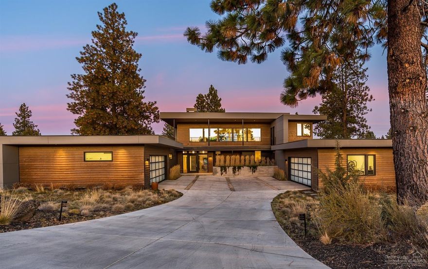 Located in the award-winning community of Tetherow, this exquisite modern masterpiece embraces true Bend living. Situated on a premier .93/AC lot & capturing phenomenal views of the 12th green & Cascade Mountains, this home features sleek finishes throughout & main level living. Elegant Great Room with a contemporary flair, soaring ceilings & natural light-filled windows overlook the luxurious outdoor living spaces w/expansive decking & dramatic firepit. Spacious kitchen designed to provide an ideal working environment for the home chef & entertainer, features solid surface counters, professional grade appliances, & a butler's pantry like no other. Private main level Master Suite w/spa-like master bath & two oversized closets. Additional en suite bedroom, office, flex space, gym & game room also on main level. Upstairs offers 2 BR+ full bath, bonus room & stunning roof top decks w/mountain views & hot tub. 4+ car garage. Minutes to Westside amenities, schools, Mt. Bachelor & trails.