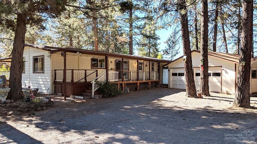 What a great location on the westside of Bend! Fully fenced one-third of an acre close to schools, shopping, recreation, and even downtown. Plenty of space and the large garage has been set up as a shop! Two bedrooms, two baths, office off of the master bedroom. Front and back porches. Windows and water heater are newer. Treed and peaceful lot with quick access to Brookswood. Possible rental income or a great starter home. Come and be part of the Romaine Village Community.