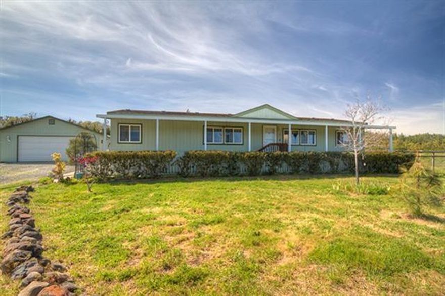 Stunning views of Mt. McLaughlin from your front porch, while overlooking the huge meadow in front of the house, make this ranch style home feel like country living at its best. The home offers 3 bedrooms and 2 full baths and over 1500 sq/ft on just over 5 gently sloping acres. There is a full 2 car detached garage and a fenced backyard area with garden shed. This property has been immaculately maintained and it is located less than 5 minutes from Dodge Bridge boat landing.