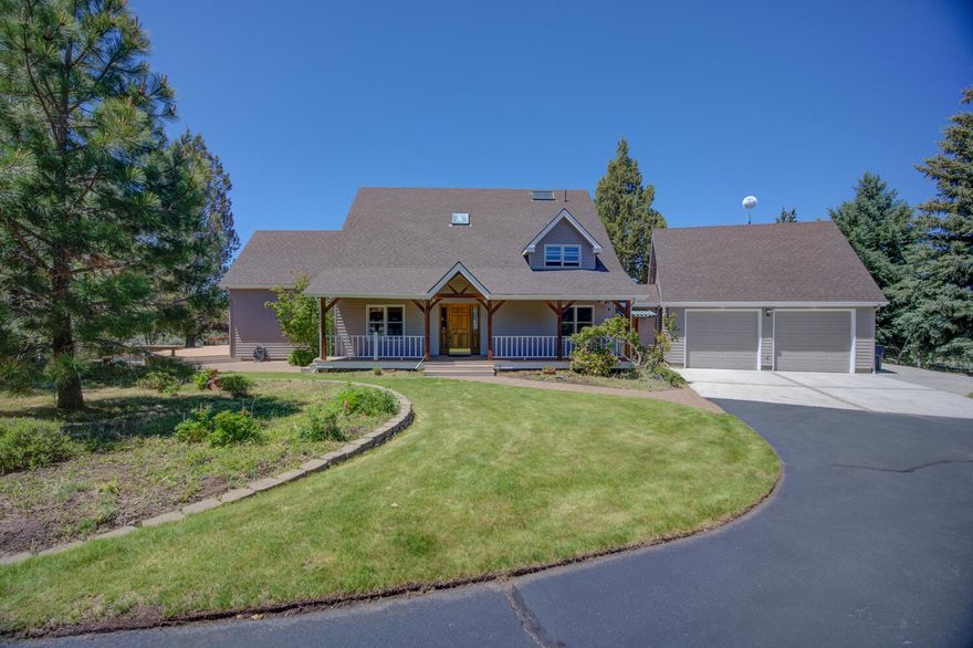 Welcome to the Timber-framed home of your dreams! This home is a true marvel with exposed peg-only timber framing and use of tongue and groove ceilings throughout. The home has refinished hardwood flooring in the entry, dining room, kitchen and stairway, and the master bath is fully tiled with a jetted tub. With 4 bedrooms, an adorable nook/art space off the kitchen, and use of vaulted ceilings, the home lives large. This home has numerous outdoor living spaces including covered porch, 2 decks and a paver patio. The English garden surrounding the home provides color in the spring and summer, and the large lot feels so private and quiet. Above the garage is a large attic storage space with endless possibilities. There is a small shop area in the large garage and a separate 576sf detached shop/garage with an attached greenhouse. Improvements include a new roof, water heater, heat pump and exterior paint in 2020. You must see this home to appreciate its incredible craftsmanship!
