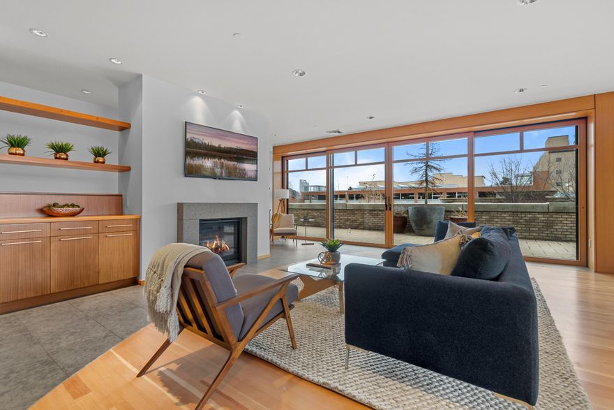 919 Bond Street condo is the pinnacle of top shelf living, located in the heart of downtown Bend.
Inside this stunning 2500+ square foot condo, you will be greeted by natural light and a high degree of craftsmanship. The open floorplan and floor to ceiling windows give an added sense of space while still maintaining your privacy. This unit is equipped with 3 en suites, each with their own walk in closet. 
New hardwood floors run throughout the living room and bedrooms. The kitchen boasts top of the line appliances such as a 20 cubic foot Viking refrigerator, a built-in Viking oven and a six burner Viking gas range.  The real showcase of the kitchen however is the 17 foot long, leathered granite counter top.
The living room features a gas fireplace, reading nook and a wet bar. 
Outside, you will find a paver patio that is equipped with a built in grill.
So whether you are hosting family, out of town guests or just a weekend away this Bond Street Condo can provide it all.