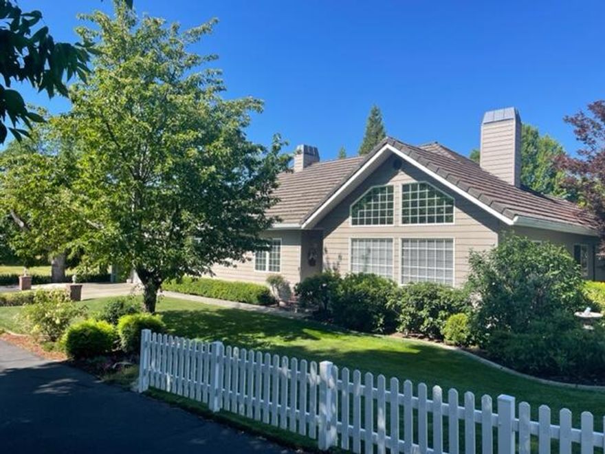 Immaculate home and property ideally located near river, parks, shopping, restaurants, and hospital. Manicured landscaping surrounds this home, 2 car garage/shop is finished, 3 car driveway with additional carport, raised beds, fully irrigated with drip system. 2 new pergolas in the backyard and much more. 

Cross your threshold into a pristine home, boasting high ceilings, granite throughout, plenty of storage, and tasteful built-ins. Expansive primary bedroom suite has two sinks, walk-in tub, walk-in shower, connected sunroom/office space, third bedroom can also be an office, mudroom has a full sink. Newer tankless water heater, HVAC system and whole home generator. A true must see!