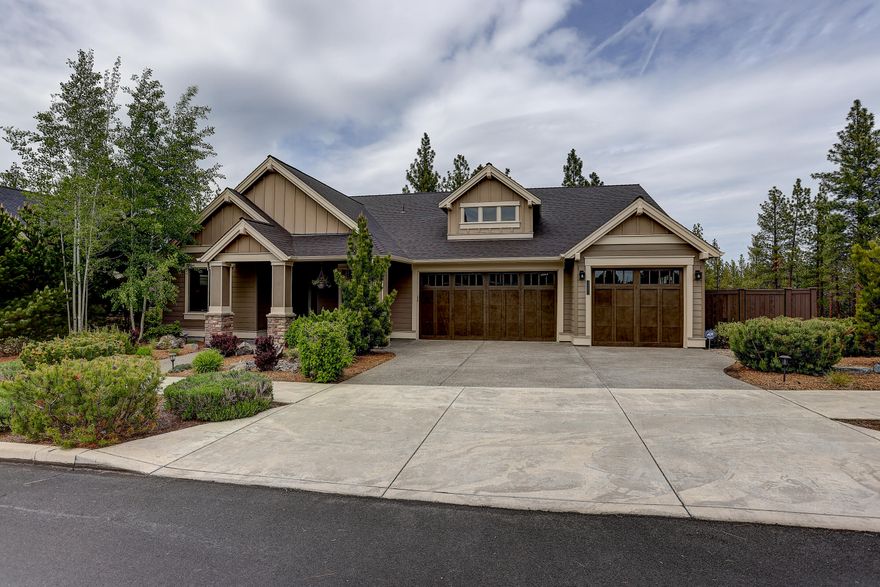 Ideal single-level layout close to Shevlin Park! Pride of ownership abounds in this stunning home. With one of the best corner lots in a coveted westside neighborhood, you will have plenty of privacy as you enjoy the park-like setting from your deck.  Soaring coffered ceilings and an inviting living area with gorgeous chef's kitchen make this home feel larger than 2400sf.  Amenities include both primary and guest suites,  acrylic flooring in the heated 3 car garage, high-end custom built-ins and floating shelves in office, solid doors throughout, and much more. Excellent storage options with a large unfinished space underneath the home.