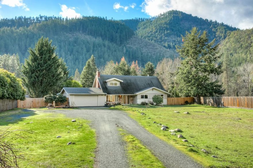 River Frontage, Pasture, Irrigation, Outbuilding, Greenhouses, 8ft Privacy Fence, 5 Bedrooms and More! This wonderful home is in the heart of the Southern Oregon wine country and has everything you could want for the self-sustained private life you are looking for. The home is open and bright, freshly painted inside and out with plenty of views to the park-like backyard and mountains. Interior has new Milgard windows throughout the home, 5 bedrooms, a hobby/sun room, woodstove, and more. Outside is a pasture for animals and/or crops, beautiful river frontage, covered patio, endless addt'l parking for vehicles/equipment in and along a private fenced area, huge partially-treed back yard, multiple greenhouses and outbuildings surrounded by a recently built 8ft wood fence. Green houses and outbuilding have power to each unit and vented temperature controlled room for drying and storing. This home truly has everything you are wanting for the dream life on the Applegate River!