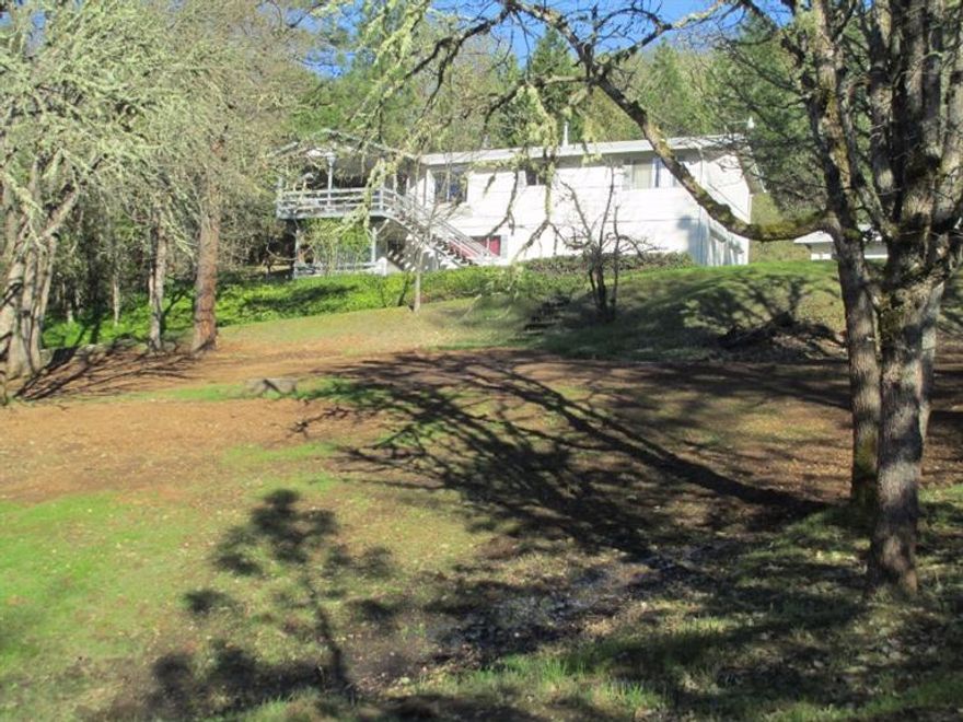 This home has so much to offer! With 2,184 square feet, it's ready for your own personal touches! Lovingly maintained by the current owners, there's a newer heating system, a new drainfield for the septic system. fresh paint inside and out, newer flooring throughout most of the home, and is clean and tidy! Situated on 2 nicely wooded acres, there's not only the 2 car garage in the daylite basement, but there's a detached 2 car garage for additional parking or for use as a shop. Also, there's a hidden elevator that could be re-activated if the new owner wants to do so. Spacious, nicely maintained, close to town and ready for new owners...is this YOUR new home? All information is deemed reliable but not verified, anyone considering the purchase of this property should perform their own investigation into the uses and condition of the property.