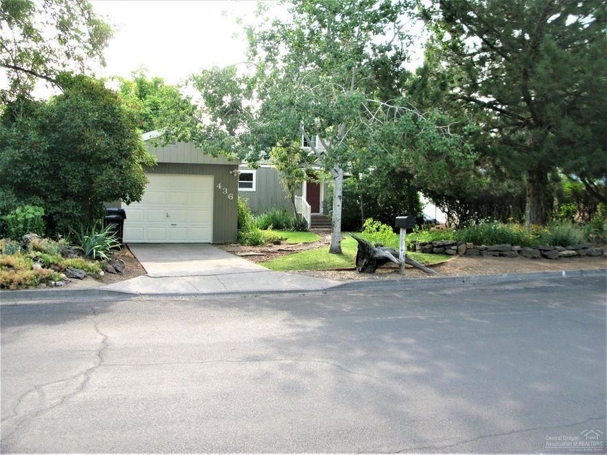 Absolutely Adorable home in Old Town Redmond! This 3 bedroom 2 full bath home has been redone over the last few years with a new roof,new siding, new flooring and windows. Gas forced air with heat pump for central heat and A/C! This home is loaded with charm inside and out!! Landscaped like a park, this is a must see!!