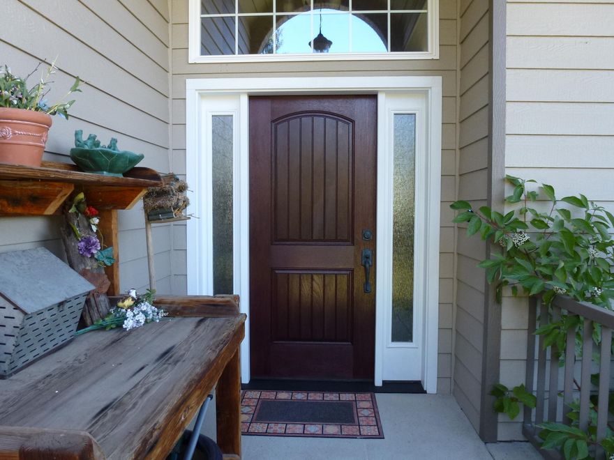 Enjoy peace and quite and the views from this updated SW Redmond home. Set on one of the larger lots in this area at .43 acre, the yard is completely fenced and offers established mature landscaping.  In addition to the spacious 3-car garage there is external RV parking. A main level master suite is approx. 20x24 with deck access (deck is wired for Hot Tub), a gas fireplace and a huge walk in closet. There is a spacious owner's bath with his and hers vanities, large tile shower and separate soaking tub.  Baths and kitchen floor are tile surface, kitchen counters are granite slab, main living areas and master bedroom have laminate plank flooring. The family room has floor to ceiling windows, recently replaced in 2019, and an updated gas fireplace. There is a front parlor/living room as well as formal dining room with built in hutch.  Upstairs features two bedrooms with en-suite baths, an office w/built in desk & cabinets, exercise or bonus room, as well as two additional rooms.