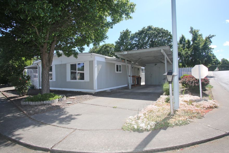 Sweet home in Aspens on the Creek offers a blend of comfort & convenience, making it a great choice for those seeking a low-maintenance lifestyle in a friendly community. Covered patio leads to the front entry. New carpet in living room, hallway & bedrooms. Dining room is open to spacious living room & big kitchen - lots of cupboards. Primary suite at back of home for added privacy. Second bedroom features a walk-in closet & is connected to hallway bathroom, potentially serving as a second suite. Third bedroom is smaller in size, suitable for an office or guest bedroom. Most windows are double-pane vinyl for energy efficiency. Refrigerator, washer, dryer included. New flooring in kitchen & hallway bathroom. New toilets. Easy access into home with two steps up. Low-maintenance yard for easy care. Well-maintained 55+ park with remodeled community building including full kitchen. Space rent $625/mo + water/sewer.