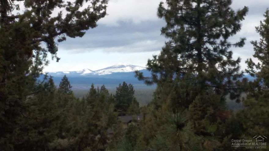This is the perfect lot to build your dream home on. A beautiful neighborhood and Cascade Mountain views. The lot is situated nicely above homes across the street. Located close to trails and everything Bend has to offer.