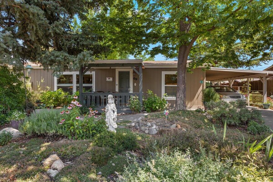 Enter into this beautifully updated 3-bedroom, 2-bath home nestled on an extra-large lot with stunning landscaping that offers both privacy and curb appeal. Inside, you'll find a light, open floor plan filled with natural sunlight, creating a warm and inviting atmosphere throughout. The spacious living area flows seamlessly into the dining and kitchen spaces—perfect for entertaining or quiet evenings at home. Each bedroom is generously sized, with the primary suite offering its own updated en-suite bath. The expansive yard provides endless possibilities: garden, play, entertain, or simply relax under the trees. A nicely finished shed could be great for storage or as an art studio. With modern upgrades, fresh finishes, and a move-in-ready condition, this home blends comfort, style, and outdoor charm. Located in Rogue Valley South, a 55+ community, this one is a must-see!