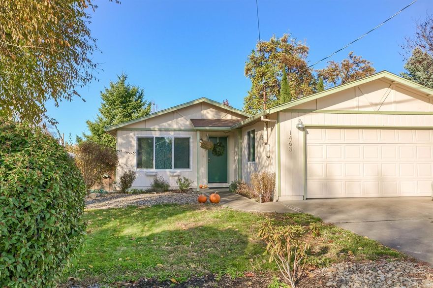 This charming home is move in ready. New vinyl windows, landscaping, flooring and updated bathrooms make this a must see! Kitchen features concrete countertops for that special touch. Extra-large windows throughout the home allow sunlight to shine in. Stepping out to the covered patio, you enter into the oversized backyard featuring a large grass lawn, fruit bearing trees and a shade tree. Close to schools and hospitals, this home has it all.