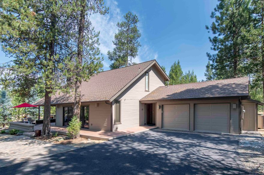 Welcome to your very own resort GEM in Sunriver! This beautiful north end home offers easy access to the Deschutes River & a layout designed for relaxation. The great room offers a classic floor-to-ceiling Lava Rock wood-burning fireplace & a convenient wet bar. The main level Flex Room w/ full bath offers versatility, perfect for a media room, bonus room/office, or even a primary bdrm suite. The downstairs also features a 2nd guest bdrm w/ an adjacent bathroom & a laundry room. Upstairs, you'll discover 2 more guest bedrms connected by a luxurious Jack n' Jill bath, complete w/ a sauna for ultimate relaxation. Enjoy the outdoors from the Trex decks that surround the home, including 1 accessible from an upstairs bdrm. This home is upgraded w/ SS kitchen appliances, newer windows, modern bathrooms, tank-less HWH, Furnace & A/C, a charming Paver patio, an oversized hot tub, & natural landscaping that creates a park-like setting on a large 0.39 acre lot. Furnished, 2-car garage.